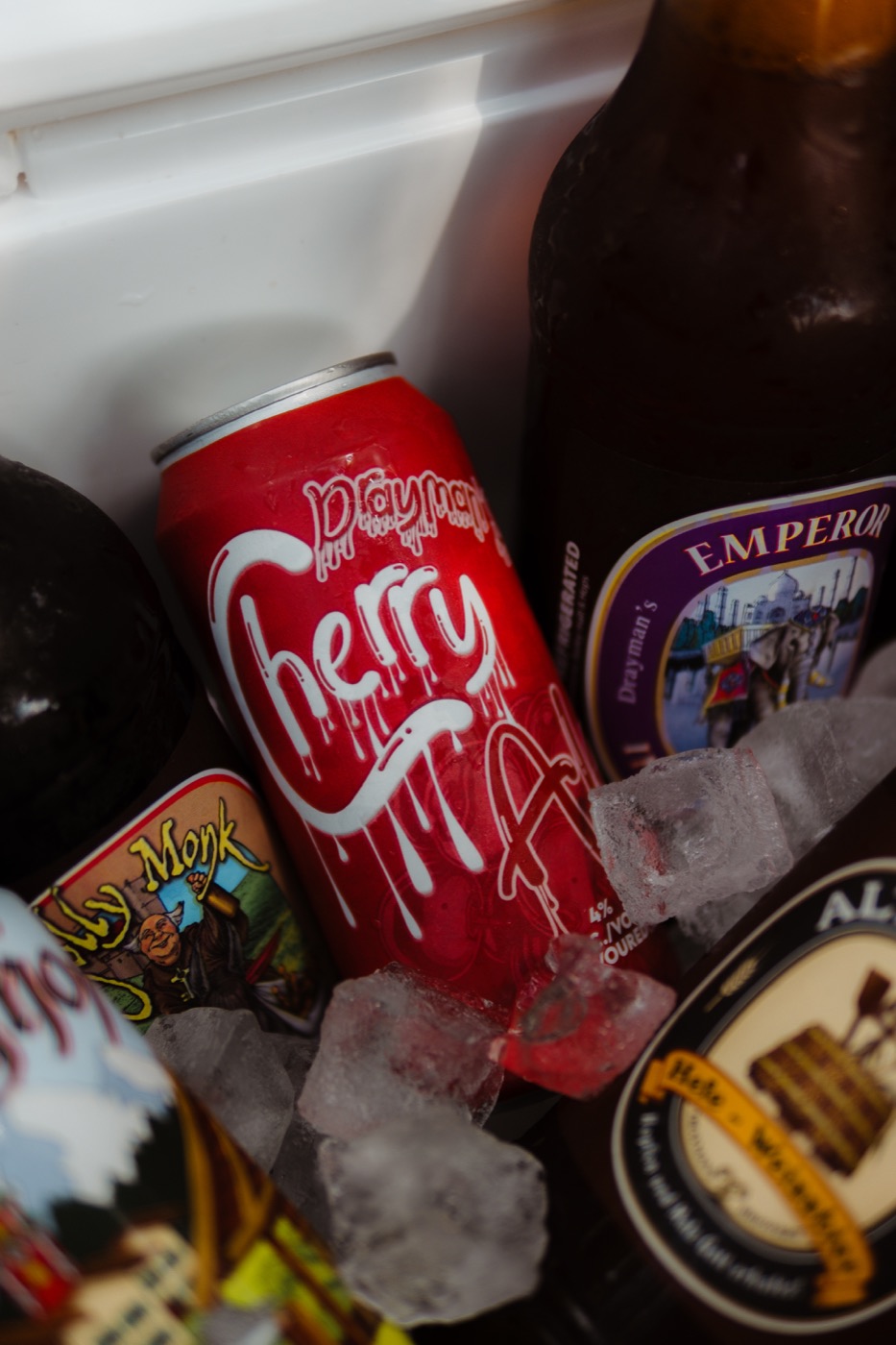 Drayman's Cherry Ale can with bottled beers on ice